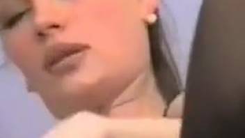 Canine penetrates woman's vagina and anus from the rear